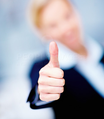 Success - macro of business persons thumbs up