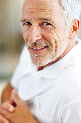 Portrait of a happy elderly man smiling