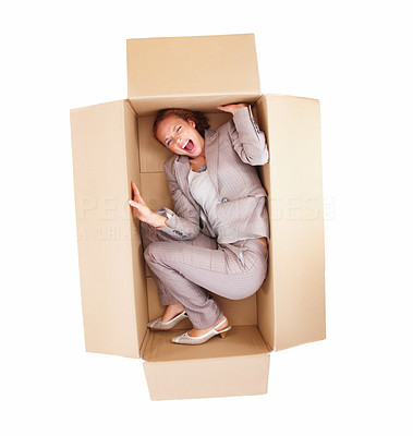 Frustrated business woman stuck in a box isolated