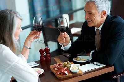 Mature couple celebrating their anniversary at a restaurant