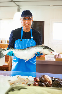 Man holding a large fish