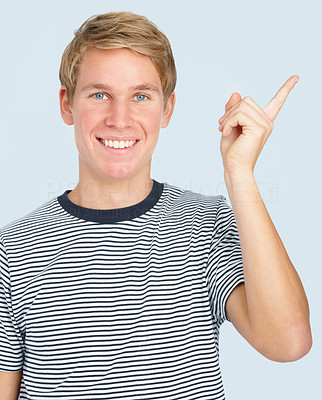 Closeup of a young man standing with hands gestured