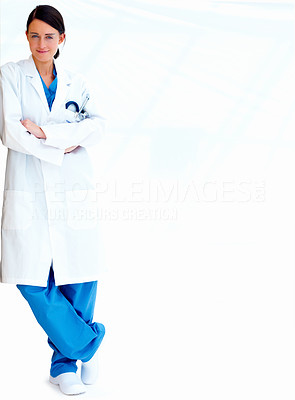 Smiling beautiful female researcher standing isolated on white