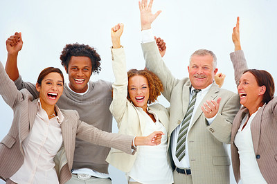Closeup of cheerful business people standing against white background