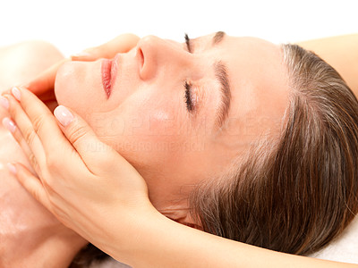 Happy woman getting face massage
