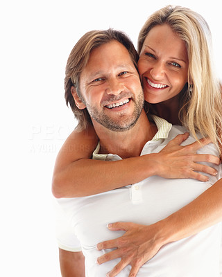 Portrait of a loving man carrying a woman on his back