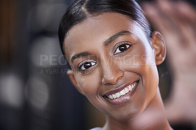 Buy stock photo Portrait of a sporty young woman taking selfies while exercising in a gym