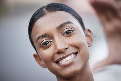 Buy stock photo Portrait of a sporty young woman taking selfies while exercising outdoors