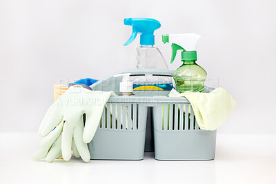 Buy stock photo Shot of a basket full of cleaning supplies on a table