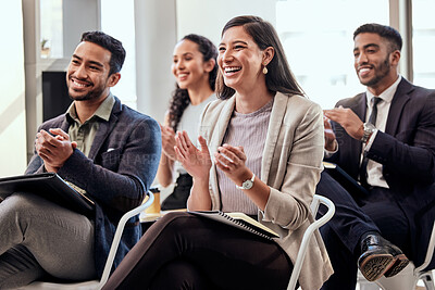 Buy stock photo Shot of a group of businesspeople clapping hands in a meeting at work