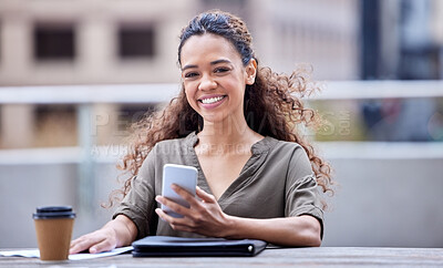 Buy stock photo Shot of a young businesswoman using a phone at work