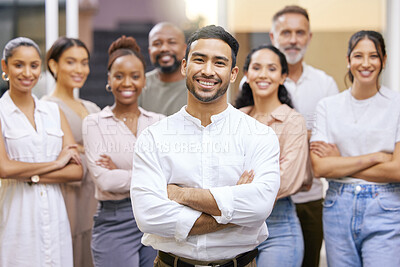 Buy stock photo Portrait of a group of businesspeople with arms folded at the office