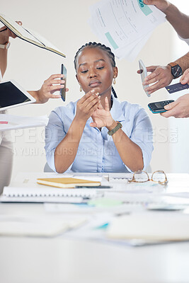 Buy stock photo Shot of a businesswoman ignoring her staff while examining her nails