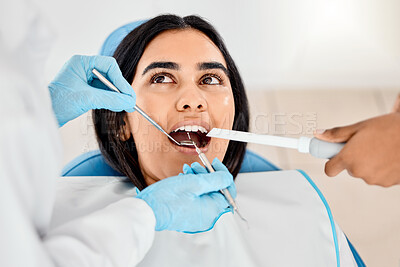 Buy stock photo Shot of a young woman having dental work done