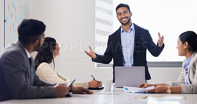 Buy stock photo Shot of a businessman delivering a presentation in the boardroom