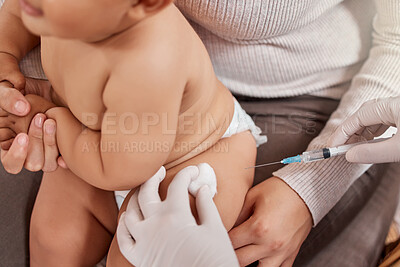Buy stock photo Shot of a little baby receiving an injection at the doctor's office