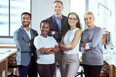 Buy stock photo Shot of a group of businesspeople standing in an office at work