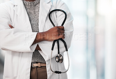Buy stock photo Shot of an unrecognisable doctor working in a modern hospital