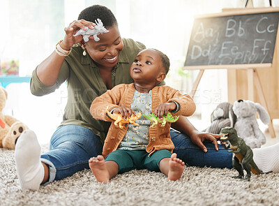 Buy stock photo Shot of a mother playing with her little daughter