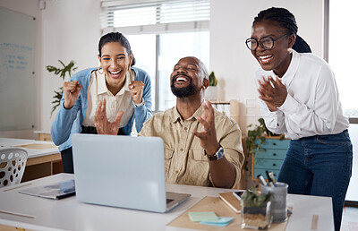 Buy stock photo Shot of a group of businesspeople using a laptop and cheering in a modern office