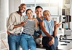 Portrait of a group of diverse cheerful businesspeople making hand gestures and spending time in an office together at work. Joyful business professionals smiling while bonding at work