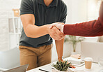 Businesspeople greeting with a handshake. Closeup of architects shaking hands in a meeting.Hands of businesspeople during an interview. Engineers collaborating with a handshake