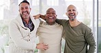 Portrait of three cheerful diverse men standing together in unity while smiling, laughing and showing strength in their bond. Biracial group of friends expressing excitement, happiness at a restaurant